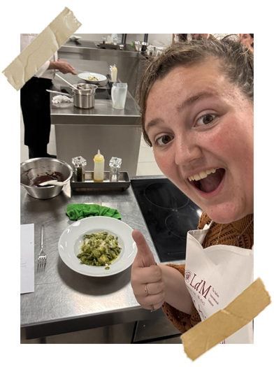 Me at a cooking class that Lorenzo de Medici offered. I am smiling with my handmade bowl of pesto pasta.