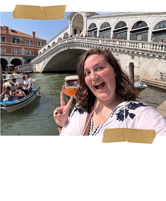 Me holding up a peace sign in front of the famous Rialto bridge.